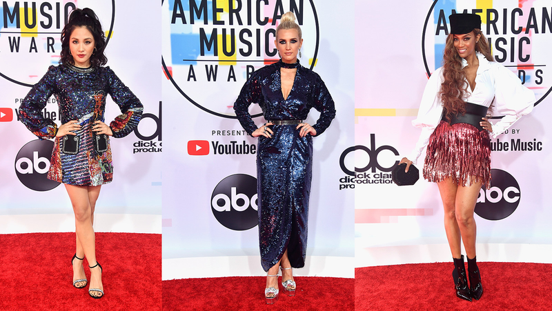 Illustration for article titled Statement Suits, Plush Pinks, and a Lotta Gowns on the American Music Awards Red Carpet